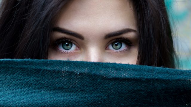 Black Haired Girl with Green eyes